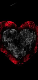 Grunge heart design with red and black hues on a mobile phone wallpaper.