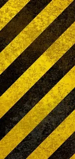 Yellow and black grunge striped wallpaper with a textured design.