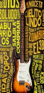 Guitar with yellow typography art on black background.