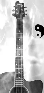 Black and white guitar with Yin Yang symbol art.