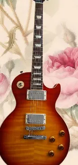 Electric guitar with pink floral background.