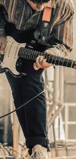 Guitarist passionately playing on stage.