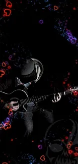 Guitarist in dark with neon hearts and lights enveloping the scene.