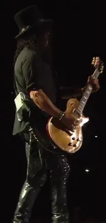 Guitarist performing on a dimly lit stage with vibrant energy.