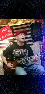 Guitarist in a red cap with artistic background.