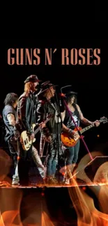 Guns N' Roses band performing live on stage with instruments.