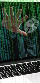 Hacker reaching through green matrix code on a laptop.