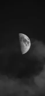 Half moon in a cloudy night sky, black and white mobile wallpaper.