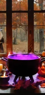 Halloween cauldron with purple potion, surrounded by candles and pumpkins.