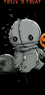 Spooky doll with pumpkin Halloween wallpaper.