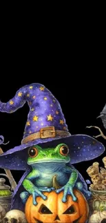 Frog in a wizard hat with Halloween pumpkin.