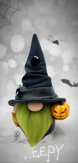 Spooky Halloween gnome wallpaper with pumpkin and witch hat.