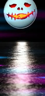 Spooky Halloween-themed moonlit ocean wallpaper with a glowing face.