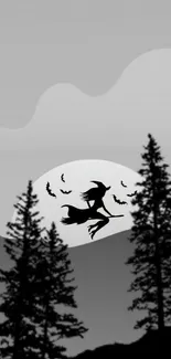 Silhouette of witch flying over pine trees at night.