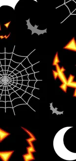 Halloween wallpaper with pumpkins and spider webs on a black background.