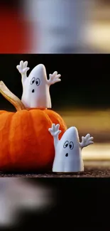 Cute white ghosts with pumpkin mobile wallpaper.