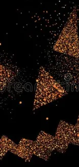 Glittering Halloween pumpkin face on dark background.