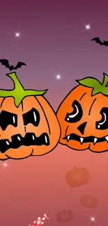 Spooky carved pumpkins with bats on a Halloween-themed wallpaper.