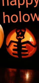 Three carved pumpkins glowing for Halloween with a dark background.