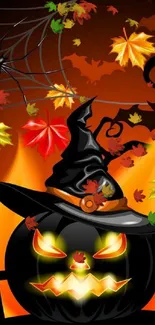 Halloween-themed pumpkin wallpaper with witch hat and autumn leaves.