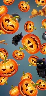 Halloween wallpaper with pumpkins, black cats, and cauldrons.