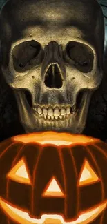 Halloween wallpaper with skull and pumpkin, glowing in darkness.