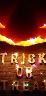 Halloween wallpaper with glowing lights and 'Trick or Treat' text.