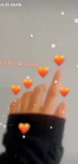 Hand with hearts and snowflakes mobile wallpaper.