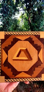 Handcrafted wooden geometric artwork in forest.