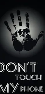 Dark handprint with 'Don't Touch My Phone' text on a black background.