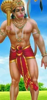 Hanuman standing with mace under bright blue sky.