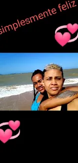 Couple smiling at beach with heart icons and happy text.