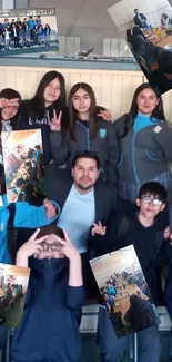 Group of students posing in blue uniforms with joyful expressions in a classroom.