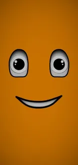 Orange wallpaper with a happy cartoon face.