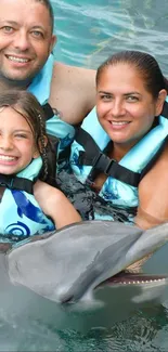 Family enjoying a swim with a dolphin, smiles all around.