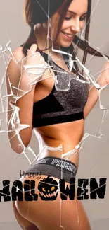 Woman in fitness attire with crackled glass and Halloween text.