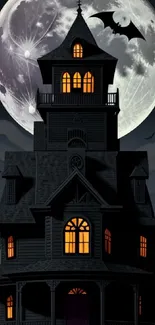 Haunted house under full moon with bats and glowing windows.