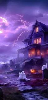 Halloween scene with haunted house and glowing pumpkins.