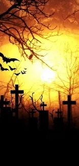 Silhouetted graveyard with bats at sunset, perfect for Halloween ambiance.