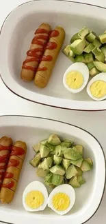 Healthy breakfast with avocado, eggs, and sausages on plates.