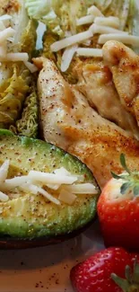 Grilled chicken with avocado and strawberries.