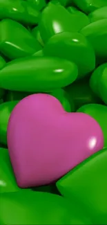 Pink heart surrounded by green stones for mobile wallpaper.