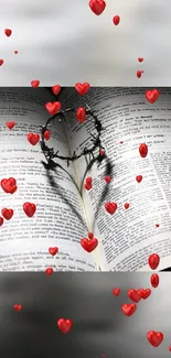 Open book with crown casting heart shadow and floating red hearts.