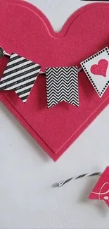 Pink heart with black and white patterns wallpaper.