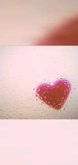 Heart and raindrops on a pink background.