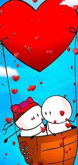 Heart-shaped balloon carrying a couple in a basket against a blue sky.