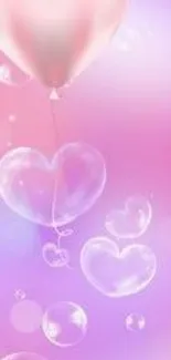 Pastel pink heart balloon and bubbles wallpaper.