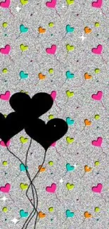 Colorful heart balloon pop art wallpaper with a gray dotted background.