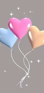 Pastel heart-shaped balloons on gray background mobile wallpaper.