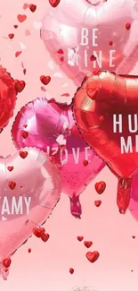 Heart-shaped balloons with love messages on a pink background.